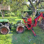 A12 mit Wematik Heckbagger
